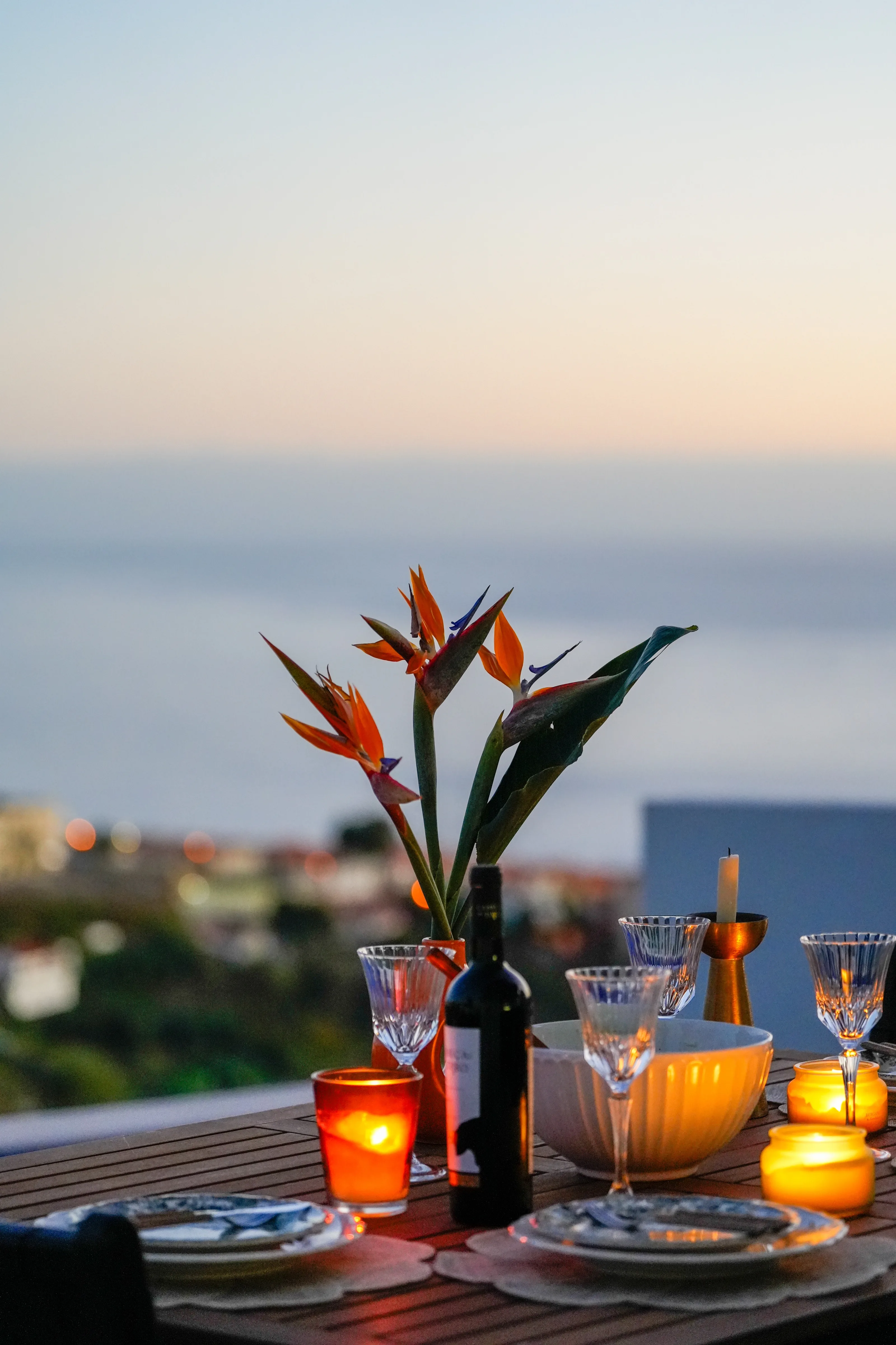 The table set for dinner as the light goes down